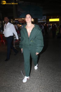 indian actress tamannaah bhatia hint of cleavage in green track suit
