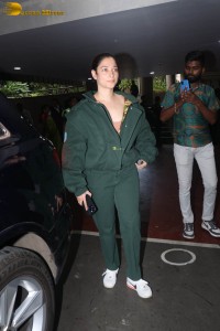 indian actress tamannaah bhatia hint of cleavage in green track suit