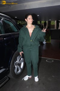 indian actress tamannaah bhatia hint of cleavage in green track suit