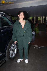 indian actress tamannaah bhatia hint of cleavage in green track suit