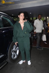 indian actress tamannaah bhatia hint of cleavage in green track suit