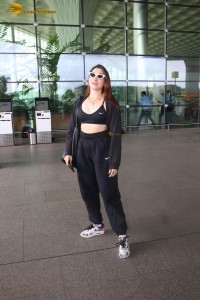 actress tamannaah bhatia in a black track suit at airport