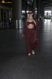 Tamannaah Bhatia sexy looks in a tiny red blouse at mumbai airport