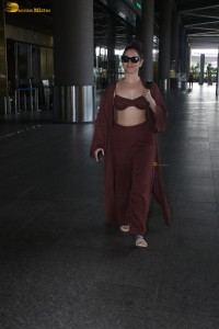 Tamannaah Bhatia sexy looks in a tiny red blouse at mumbai airport