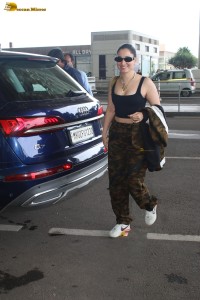 actress Tamannaah Bhatia hot in a sleeveless black top spotted at airport