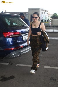 actress Tamannaah Bhatia hot in a sleeveless black top spotted at airport