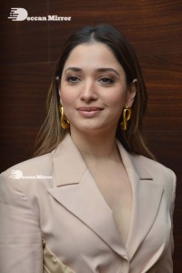 Tamannaah Bhatia in a light pink pant suit dress