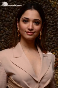 Tamannaah Bhatia in a light pink pant suit dress