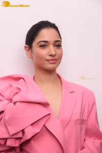 Actress Tamannaah Bhatia in a pink pant suit dress