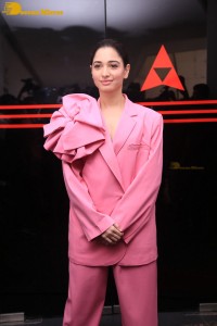 Actress Tamannaah Bhatia in a pink pant suit dress