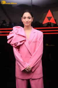 Actress Tamannaah Bhatia in a pink pant suit dress