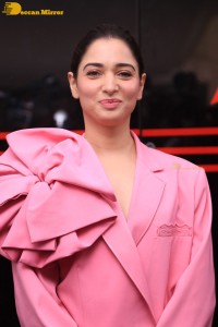 Actress Tamannaah Bhatia in a pink pant suit dress