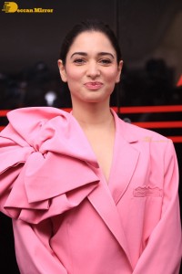 Actress Tamannaah Bhatia in a pink pant suit dress