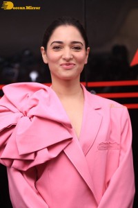 Actress Tamannaah Bhatia in a pink pant suit dress