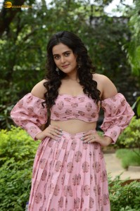 actress Tanvi Negi cute in a shoulderless dress