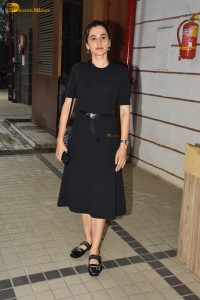 actress Taapsee Pannu in a black dress