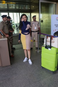 actress tejasswi prakash cute in black top and yellow skirt