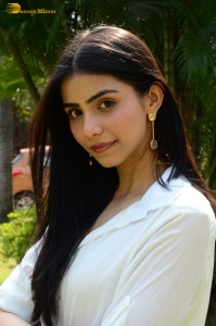 Tollywood actress tina shilparaj in a white top and colorful skirt