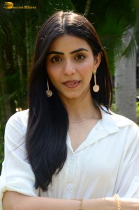 Tollywood actress tina shilparaj in a white top and colorful skirt