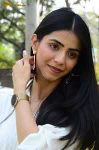 Tollywood actress tina shilparaj in a white top and colorful skirt