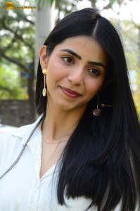 Tollywood actress tina shilparaj in a white top and colorful skirt