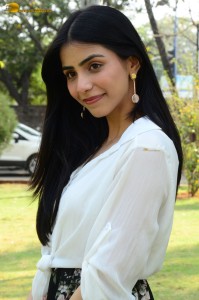 Tollywood actress tina shilparaj in a white top and colorful skirt