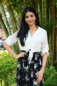 Tollywood actress tina shilparaj in a white top and colorful skirt