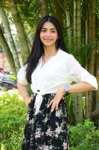 Tollywood actress tina shilparaj in a white top and colorful skirt