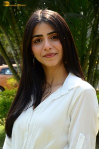 Tollywood actress tina shilparaj in a white top and colorful skirt