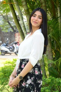 Tollywood actress tina shilparaj in a white top and colorful skirt