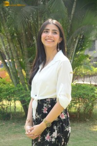 Tollywood actress tina shilparaj in a white top and colorful skirt