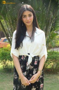 Tollywood actress tina shilparaj in a white top and colorful skirt