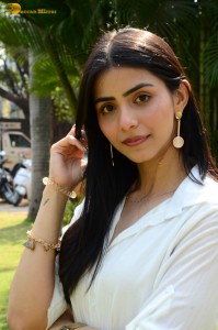 Tollywood actress tina shilparaj in a white top and colorful skirt