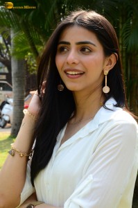 Tollywood actress tina shilparaj in a white top and colorful skirt