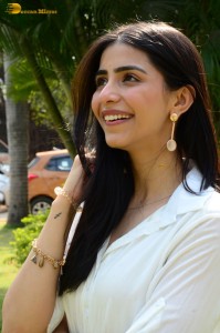 Tollywood actress tina shilparaj in a white top and colorful skirt