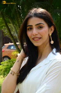 Tollywood actress tina shilparaj in a white top and colorful skirt