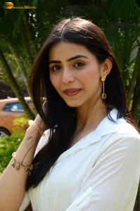 Tollywood actress tina shilparaj in a white top and colorful skirt