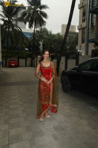 bollywood actress tripti dimri dazzles in a red salwar dress