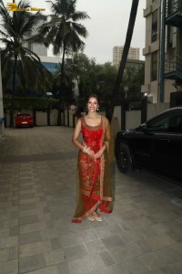 bollywood actress tripti dimri dazzles in a red salwar dress