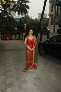 bollywood actress tripti dimri dazzles in a red salwar dress