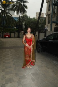 bollywood actress tripti dimri dazzles in a red salwar dress