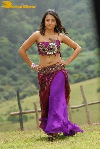 Trisha in a pink shoulderless dress for a film shoot