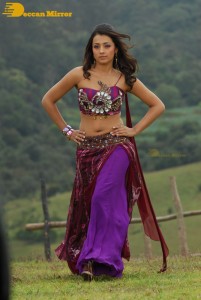 Trisha in a pink shoulderless dress for a film shoot