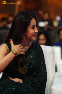 Indian actress trisha shines in a green saree at a movie event