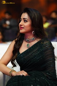 Indian actress trisha shines in a green saree at a movie event