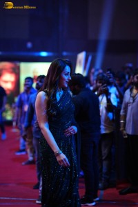 Indian actress trisha shines in a green saree at a movie event