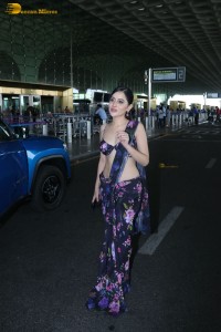 actress urji javed hot looks in a revealing saree at airport