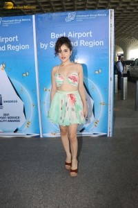 urfi javed in a green top and mini skirt at mumbai airport