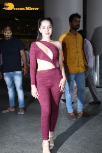 Urfi Javed in a crimson color dress shows off glamour at Airport