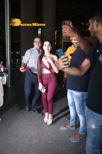 Urfi Javed in a crimson color dress shows off glamour at Airport
